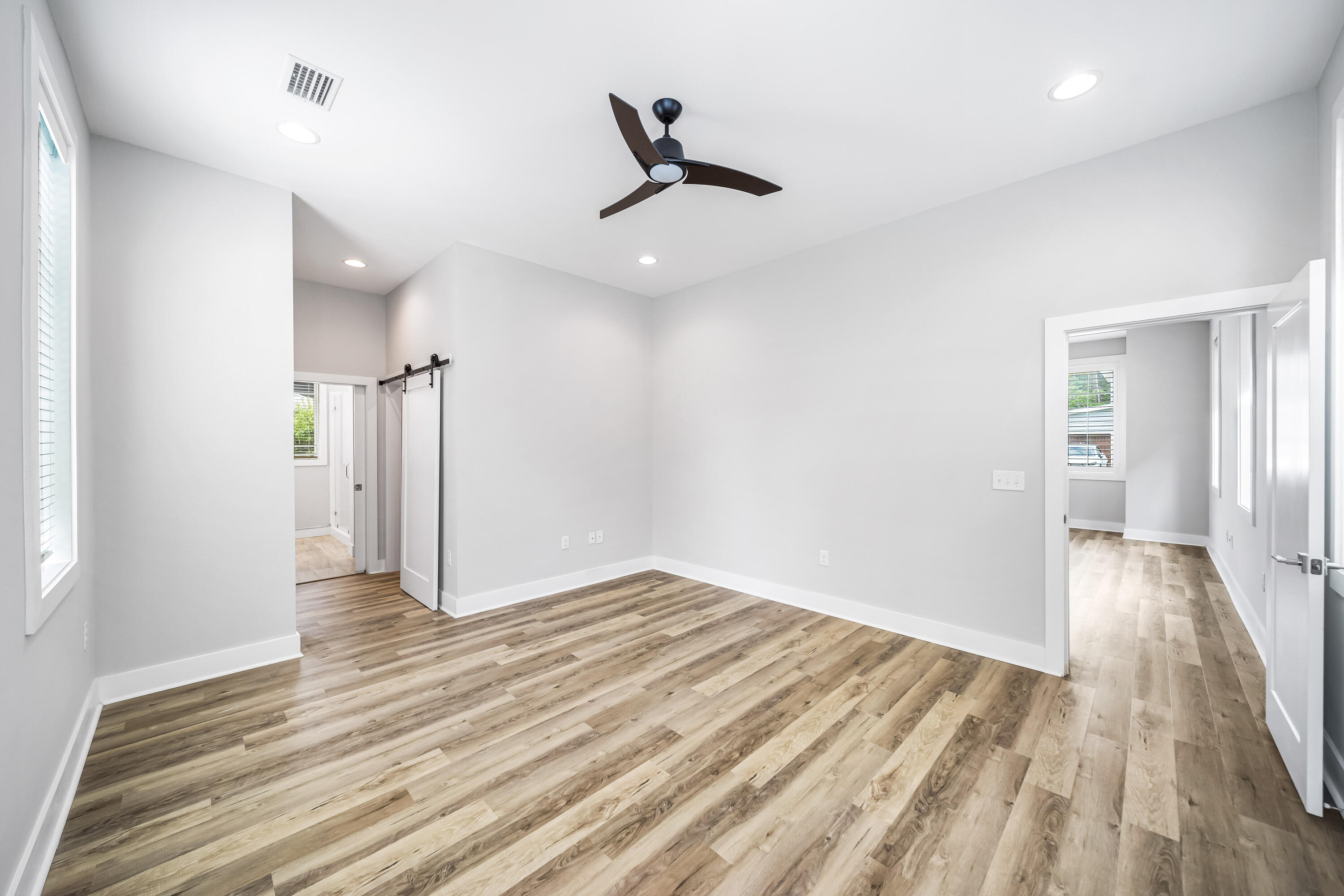 61 Edens Landing Circle Santa Rosa Beach, FL 32459 - Photo 15 of 30 a view of an empty room and wooden floor