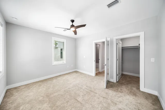 a view of empty room with windows