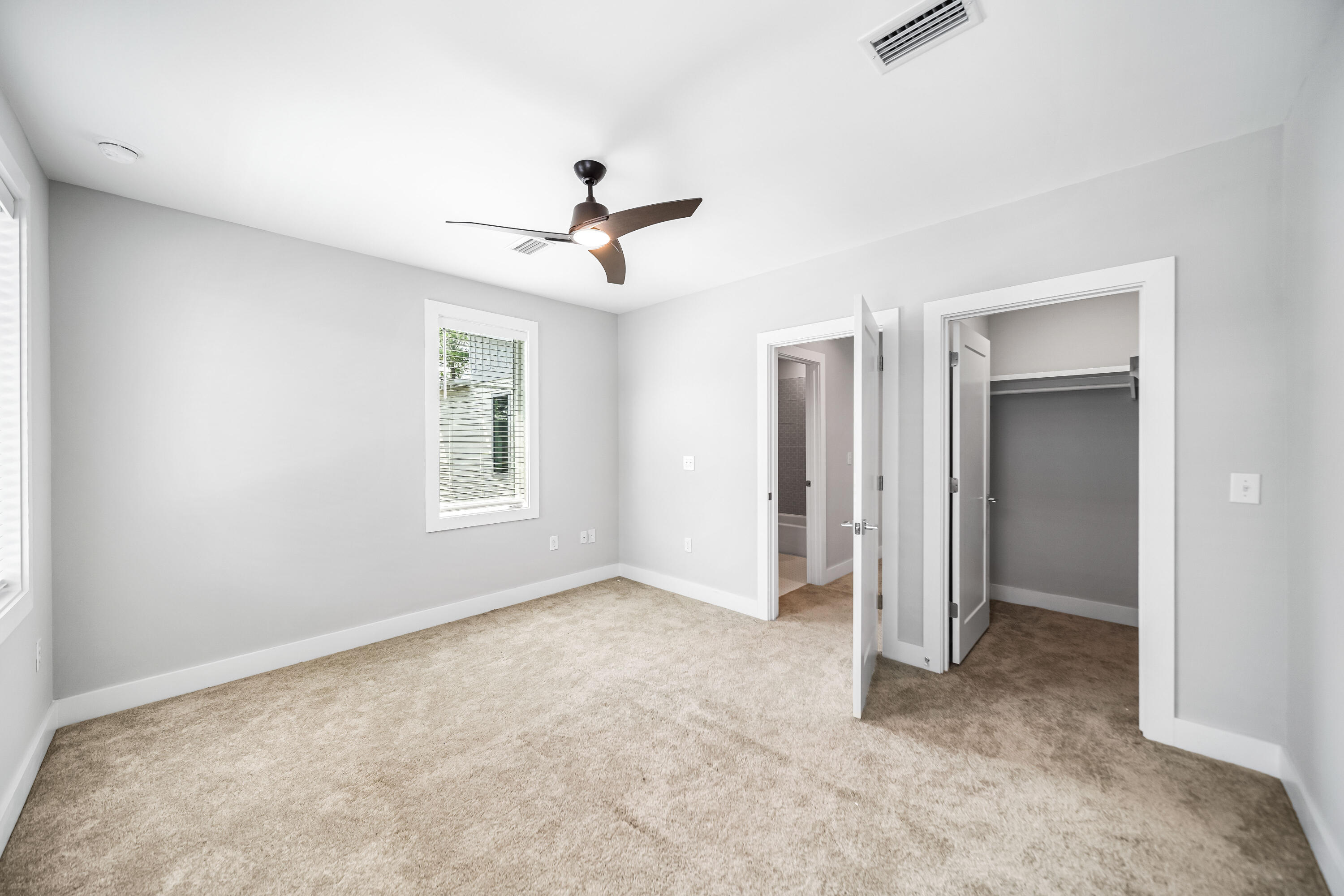 61 Edens Landing Circle Santa Rosa Beach, FL 32459 - Photo 21 of 30 a view of empty room with windows