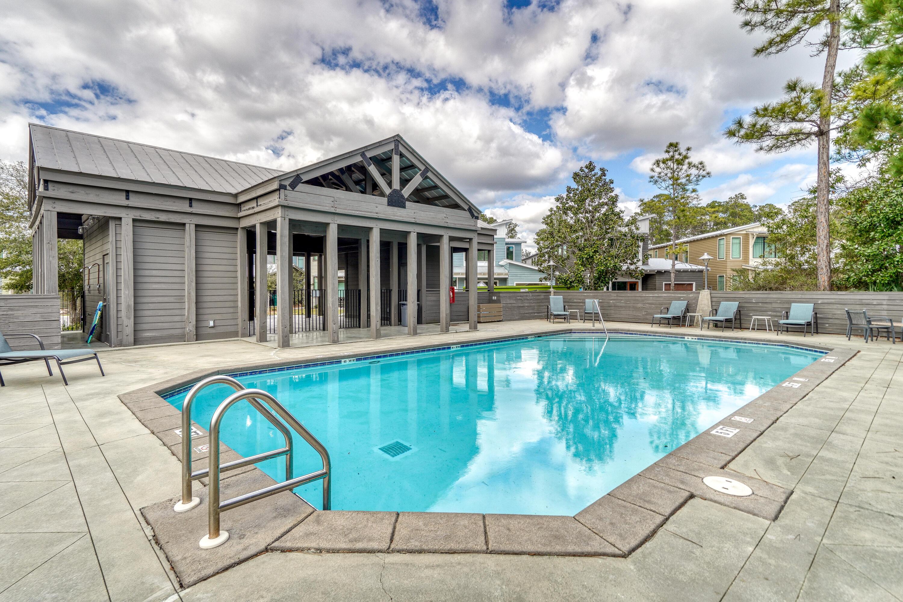 61 Edens Landing Circle Santa Rosa Beach, FL 32459 - Photo 29 of 30 a view of a swimming pool with a patio