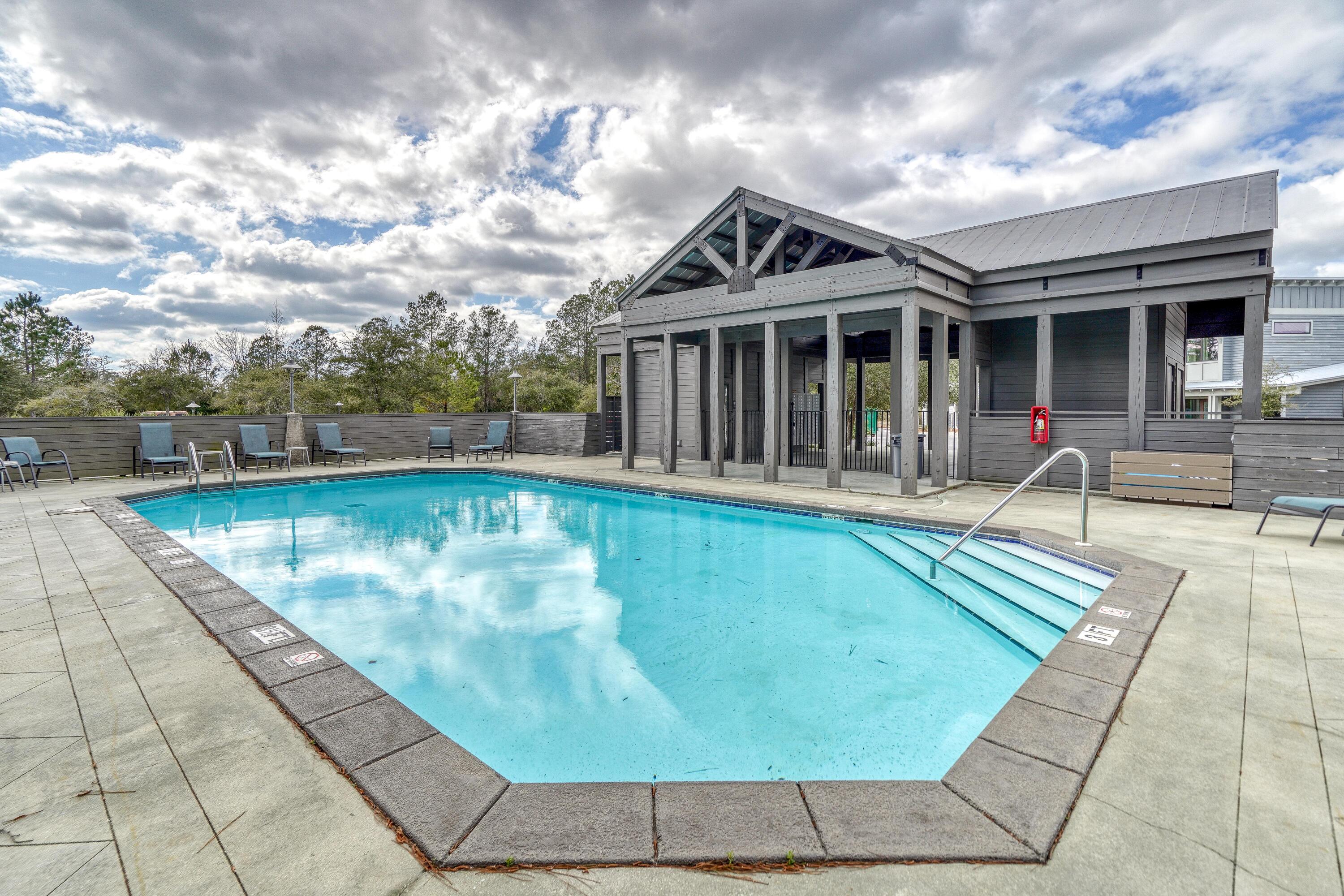 61 Edens Landing Circle Santa Rosa Beach, FL 32459 - Photo 30 of 30 a view of a house with swimming pool and sitting area