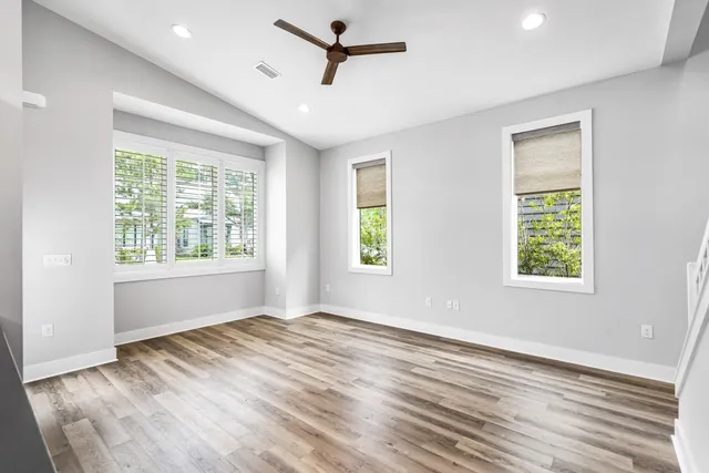 a view of room window and wooden floor