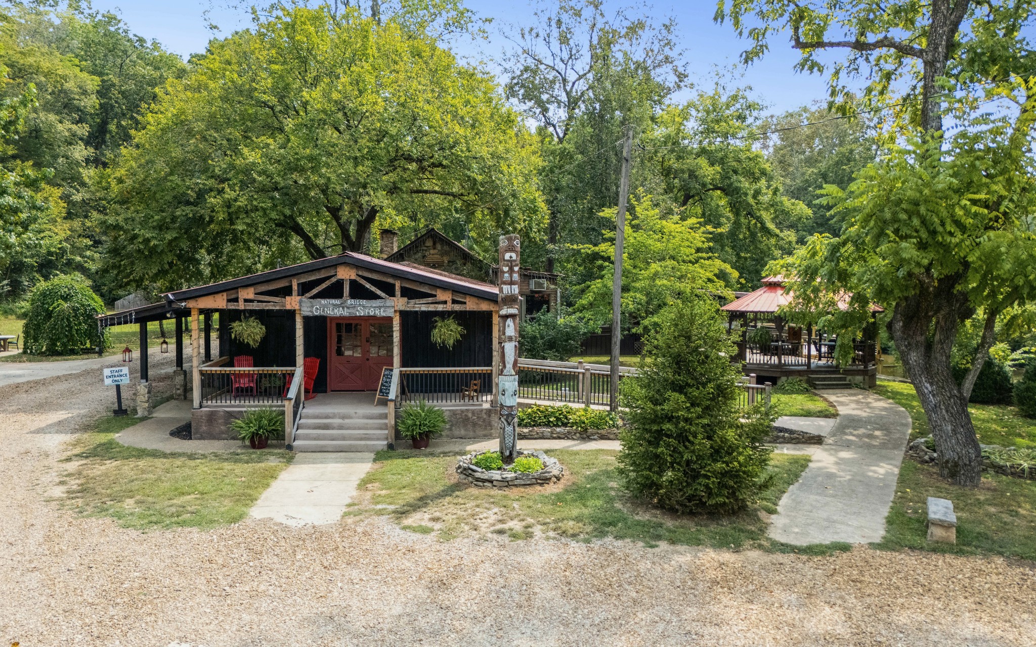 299 Natural Bridge Park Road Waynesboro, TN 38485 - Photo 19 of 63 a view of a house with a yard