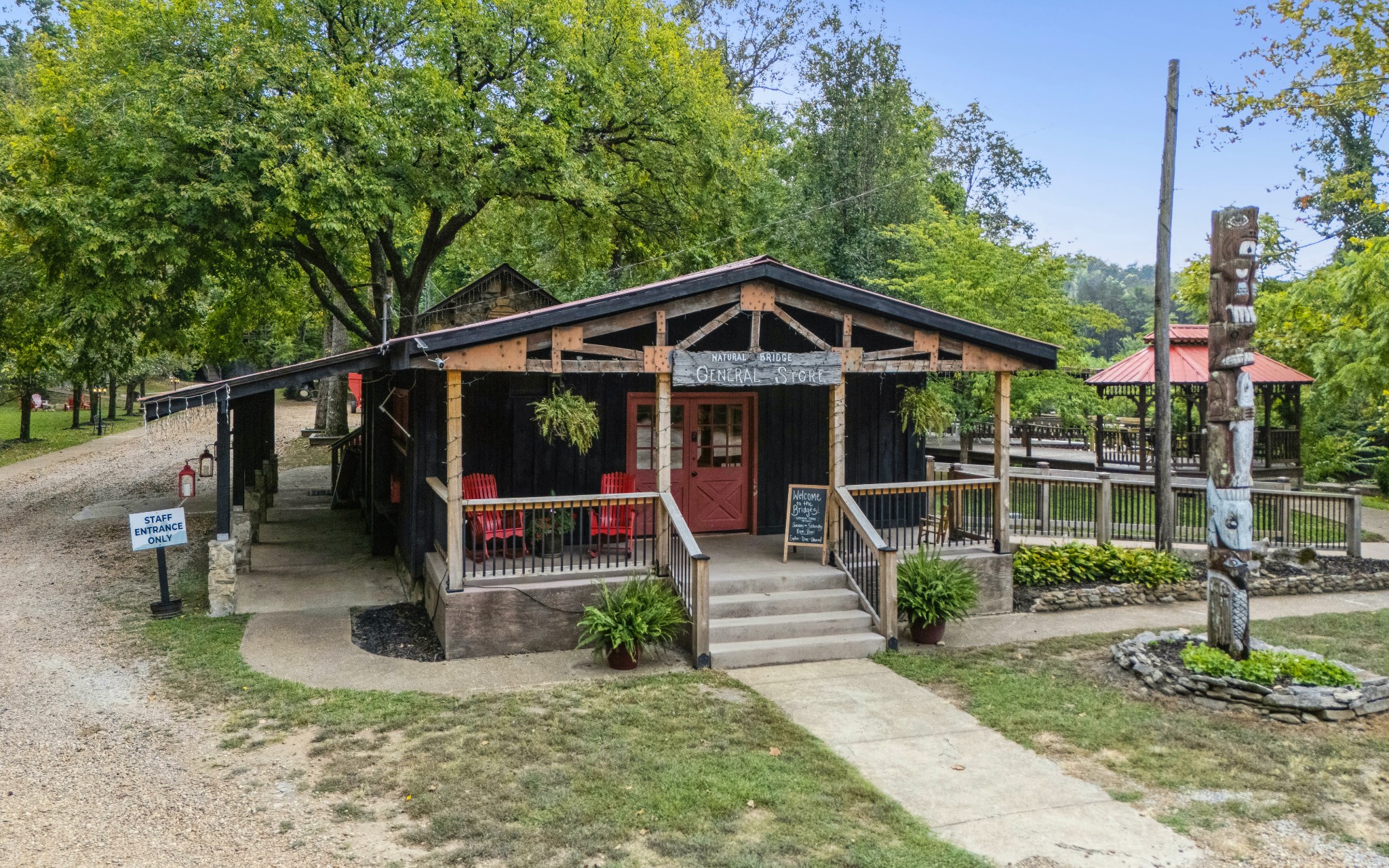 299 Natural Bridge Park Road Waynesboro, TN 38485 - Photo 23 of 63 a front view of a house with porch