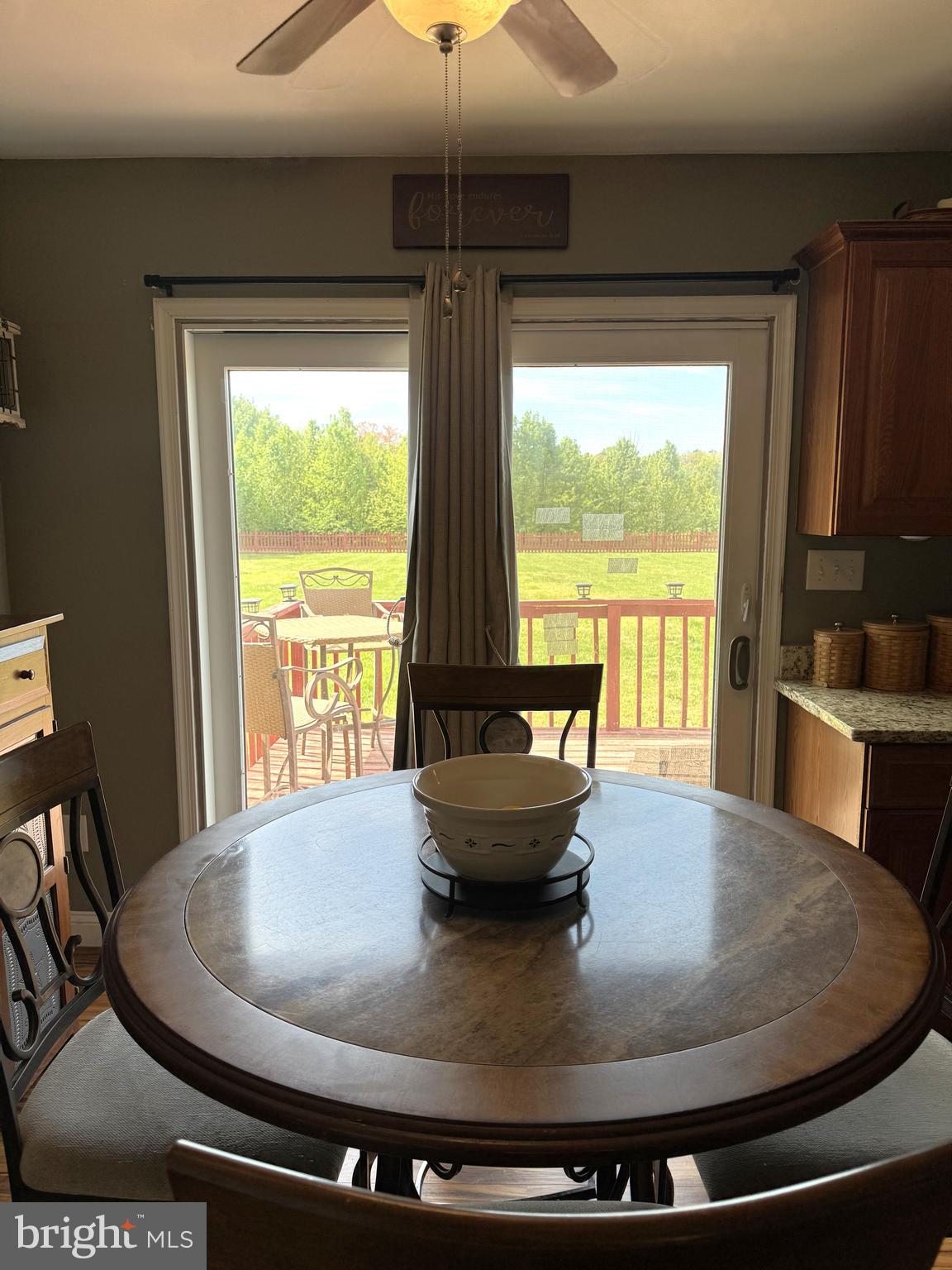 26210 Oak Grove Road Seaford, DE 19973 - Photo 13 of 33 a view of a dining room with furniture window and outside view