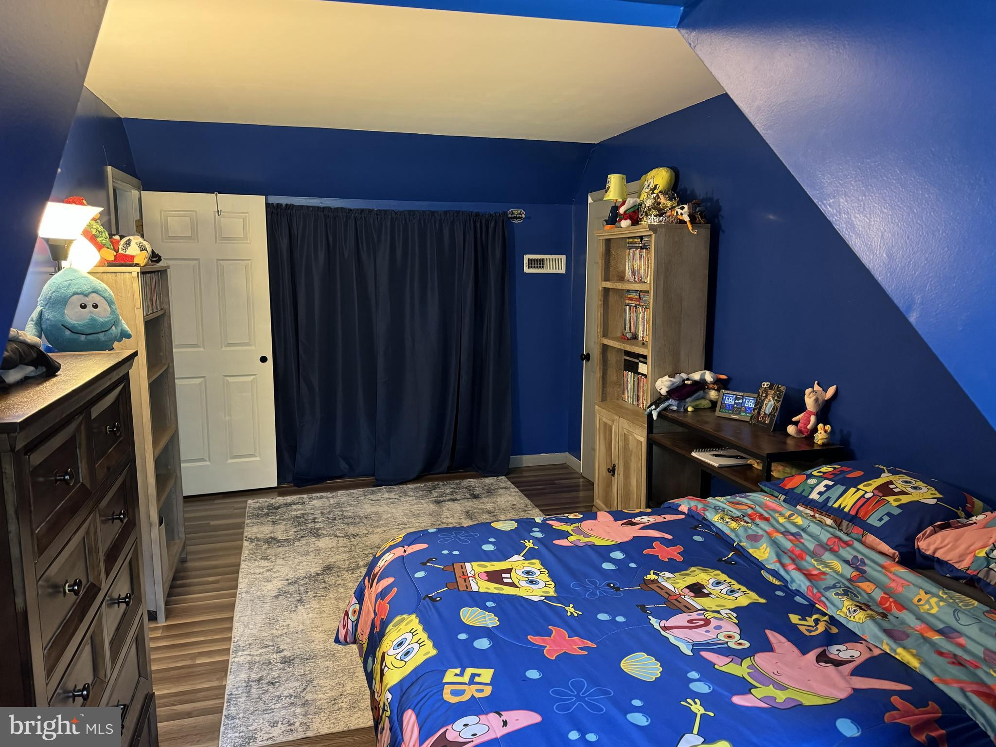 26210 Oak Grove Road Seaford, DE 19973 - Photo 22 of 33 a bedroom with bed and a closet