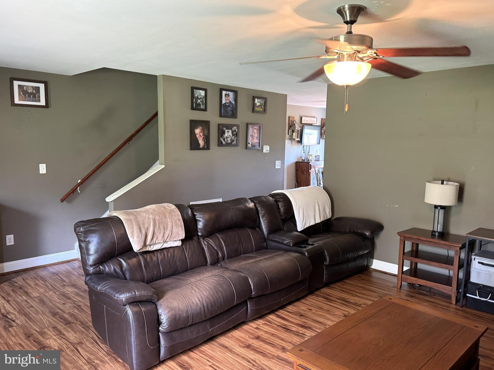 26210 Oak Grove Road Seaford, DE 19973 - Photo 5 of 33 a living room with furniture and a rug
