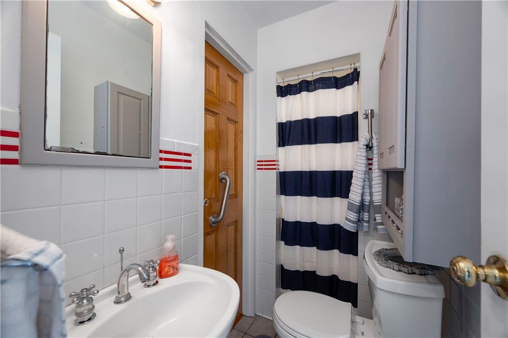 120 West Sunbury Road Butler, PA 16001 - Photo 25 of 46 a bathroom with a sink and a toilet