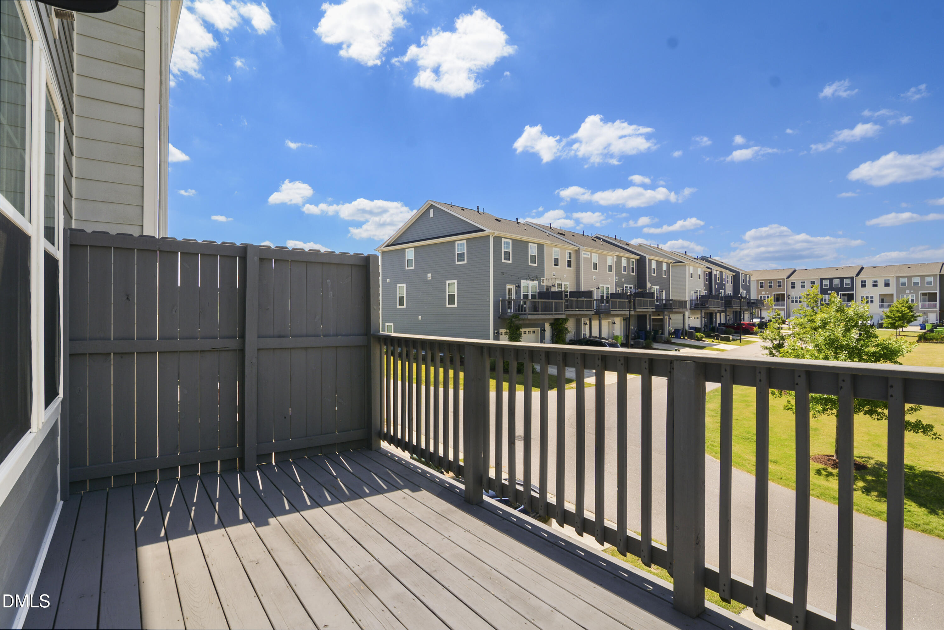 5916 Giddings Street Raleigh, NC 27616 - Photo 30 of 49 a view of a balcony with wooden floor