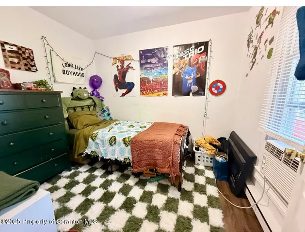 a bed room with a bed and a couch