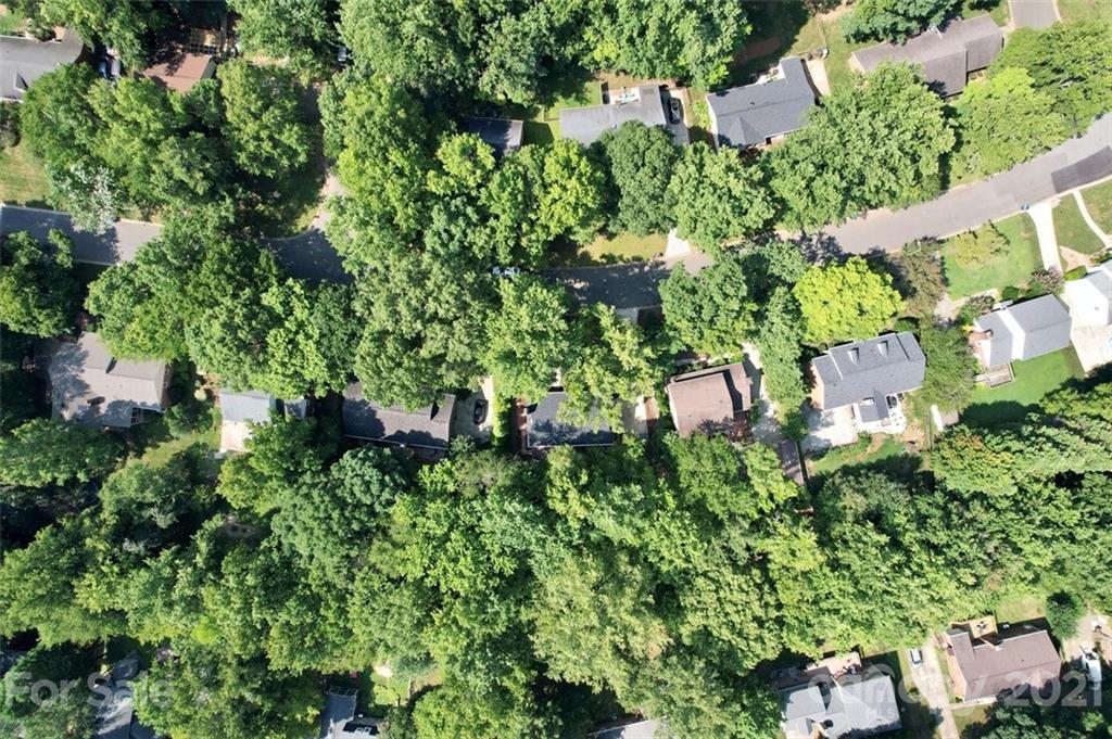638 Trail Ridge Road Matthews, NC 28105 - Photo 36 of 36 an aerial view of residential house with outdoor space and trees all around