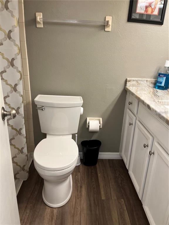5640 Ferguson Court, Unit 2205 New Port Richey, FL 34652 - Photo 13 of 23 a bathroom with a toilet and a sink