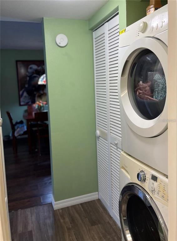 5640 Ferguson Court, Unit 2205 New Port Richey, FL 34652 - Photo 10 of 23 a view of a hallway with washer and dryer
