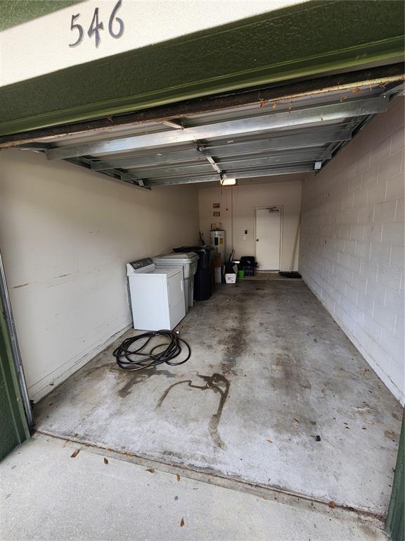 546 Climbing Ivy Court, Unit C Apopka, FL 32712 - Photo 25 of 26 a view of a room with gym equipment