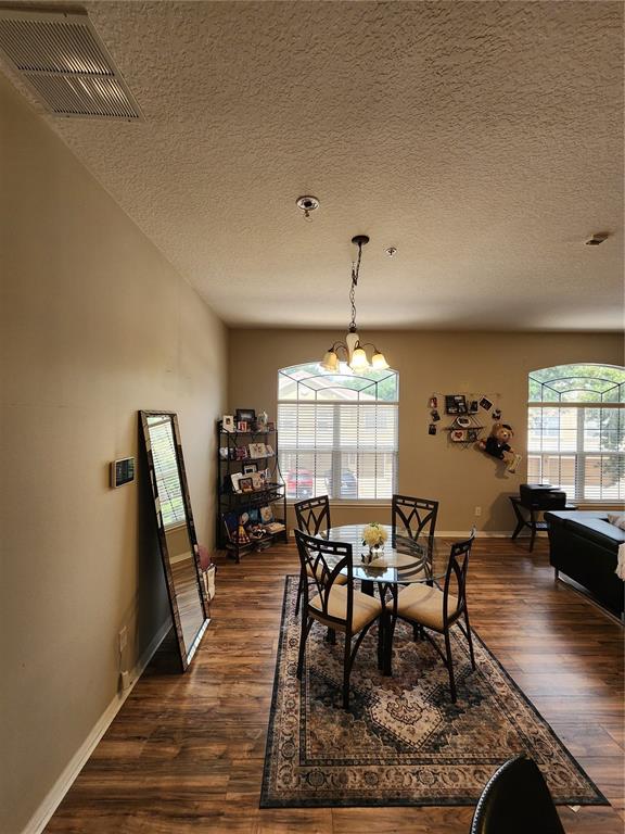 546 Climbing Ivy Court, Unit C Apopka, FL 32712 - Photo 9 of 26 a view of a dining room with furniture