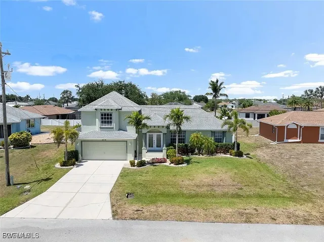 a view of house with outdoor space