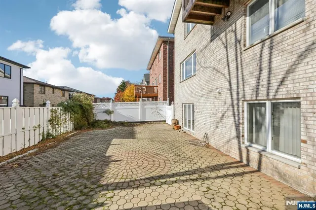 a view of a back yard of the house