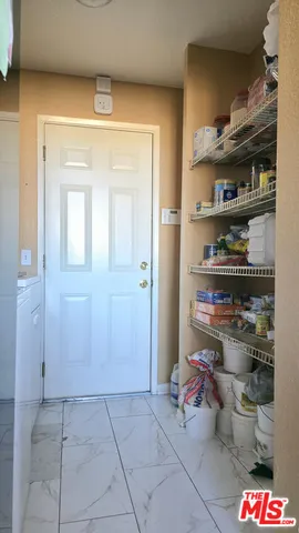 a view of storage and utility room