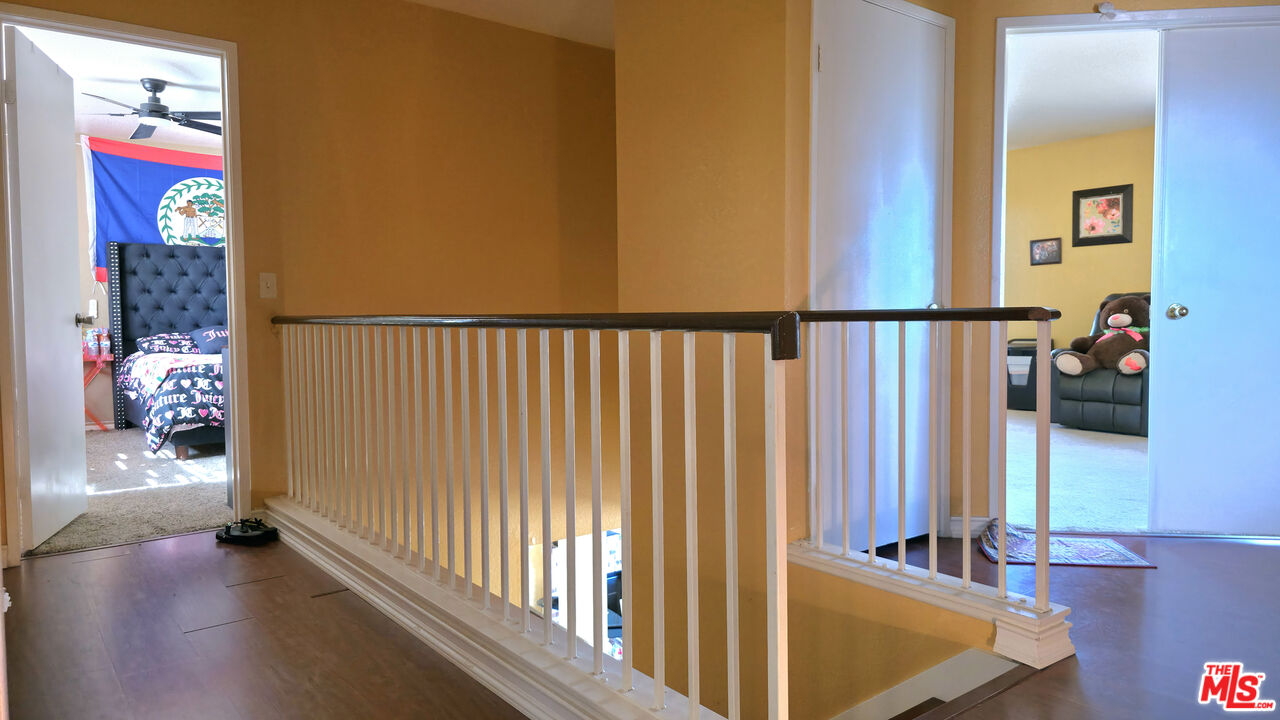 11532 Autumn Street Adelanto, CA 92301 - Photo 16 of 32 a view of a hallway with interior of the house