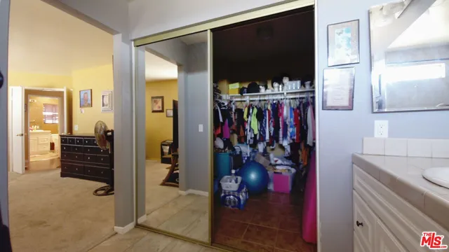 a view of a walk in closet