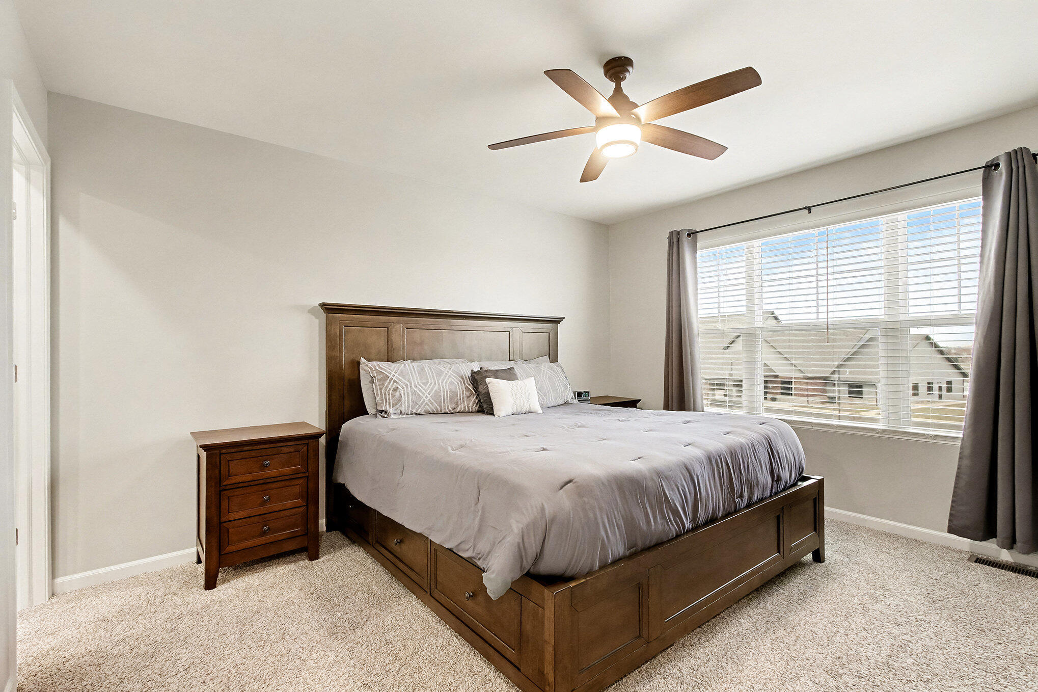 8690 Larkspur Lane St. John, IN 46373 - Photo 11 of 21 a bedroom with a bed and window