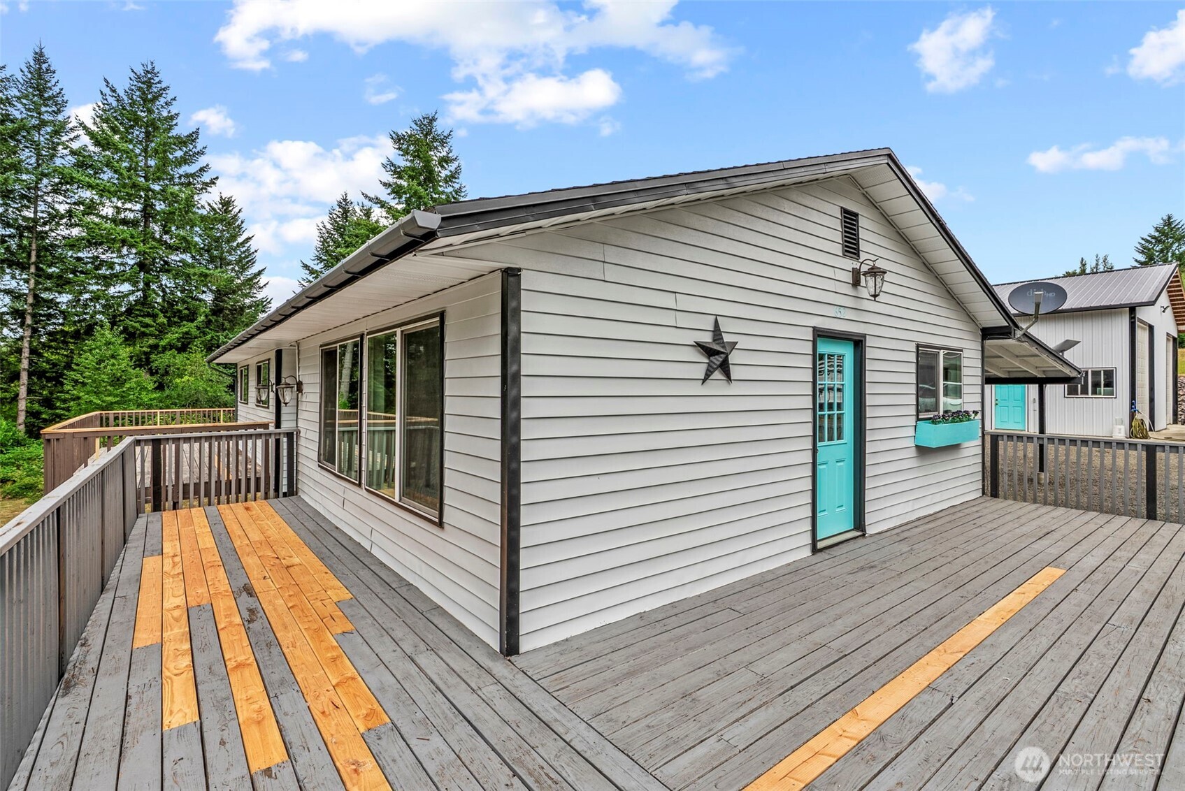 652 Ragland Road Longview, WA 98632 - Photo 3 of 40 a view of wooden deck with a patio