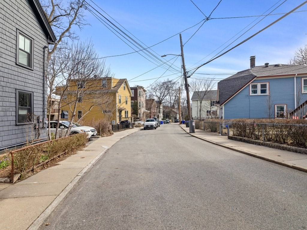 47 R Jamaica Street, Unit 3 Boston, MA 02130 - Photo 17 of 18 a view of a street with a building in the background