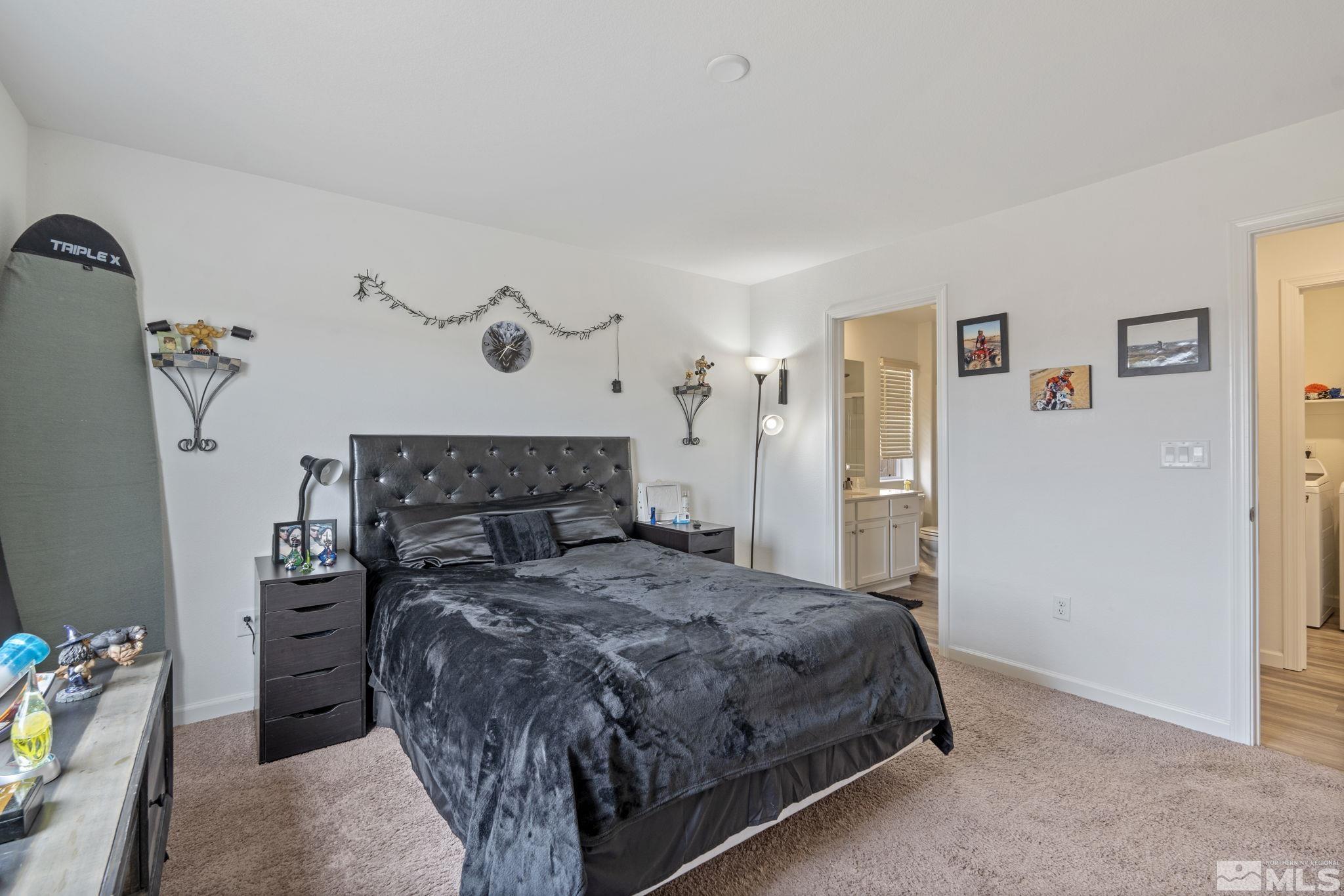 677 Mcgill Drive Reno, NV 89506 - Photo 17 of 29 a bedroom with a bed and a window