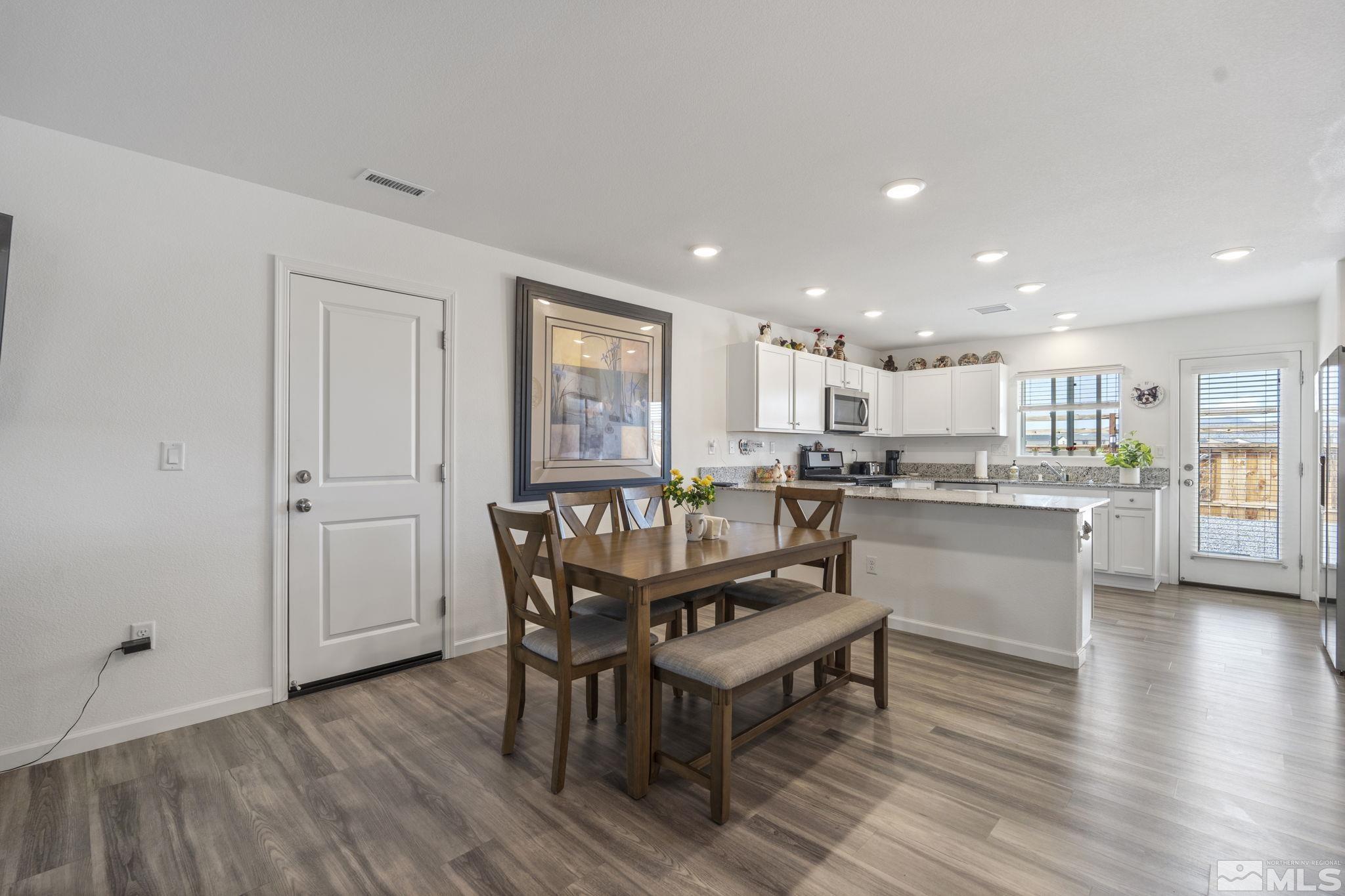 677 Mcgill Drive Reno, NV 89506 - Photo 25 of 29 a dining room with furniture and wooden floor