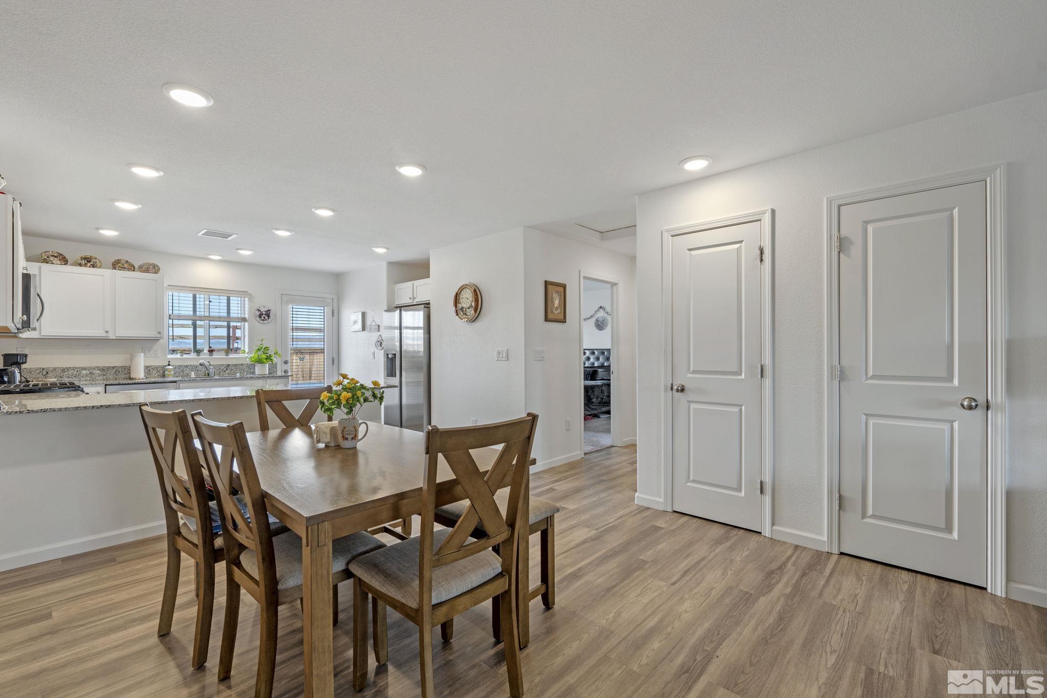 677 Mcgill Drive Reno, NV 89506 - Photo 26 of 29 a view of a dining room with furniture and wooden floor