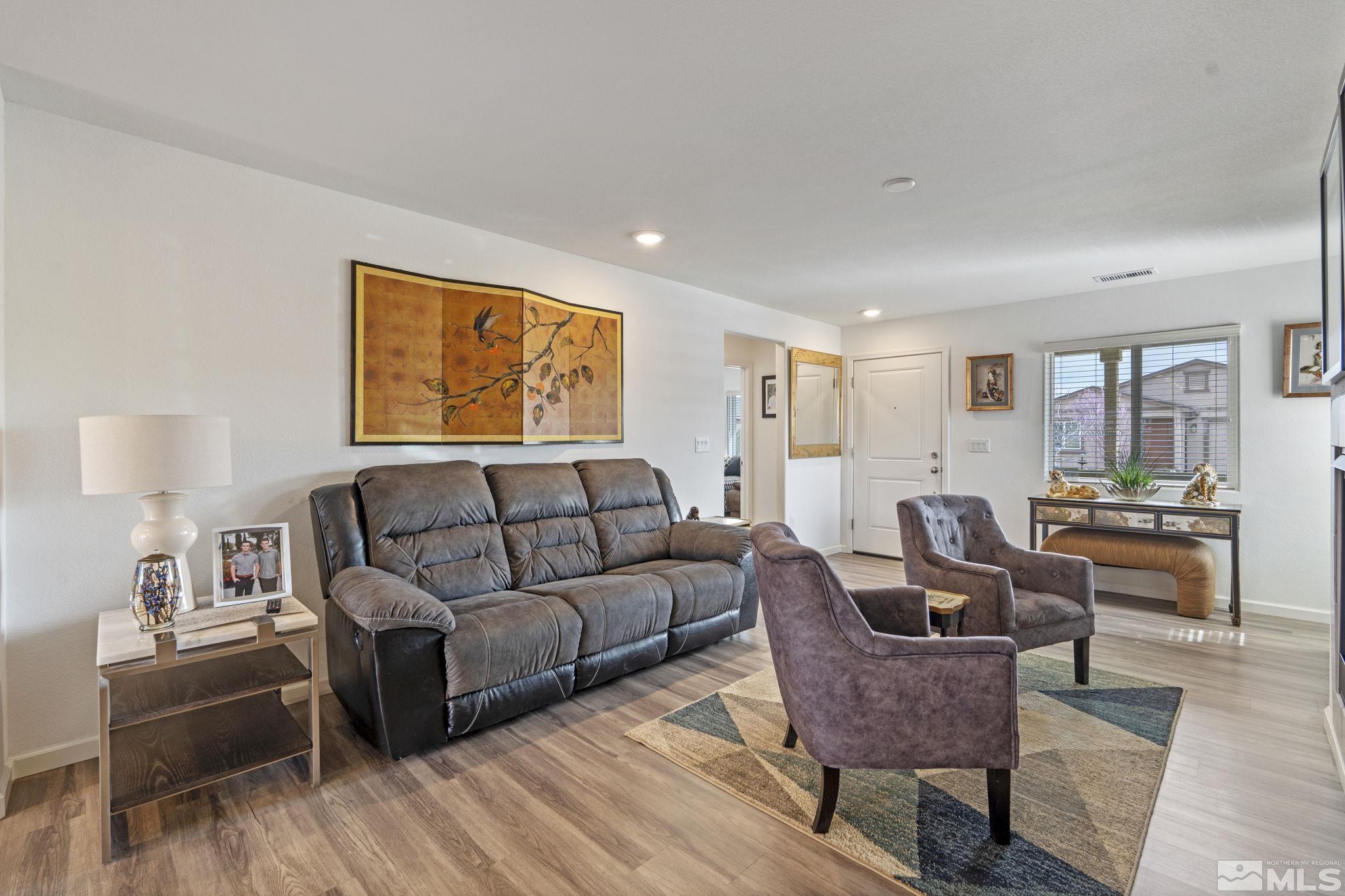 677 Mcgill Drive Reno, NV 89506 - Photo 6 of 29 a living room with furniture and wooden floor
