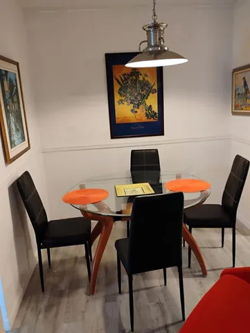 a view of a workspace with furniture