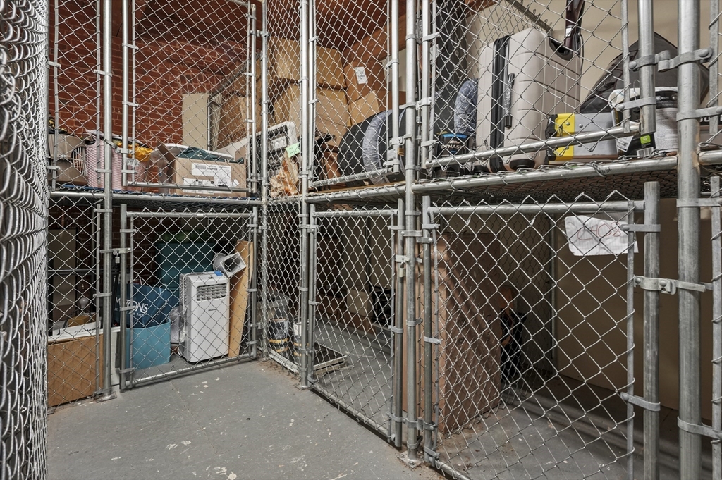 1511 Main Street, Unit C405 Worcester, MA 01603 - Photo 21 of 23 a view of a street with brick wall and fence