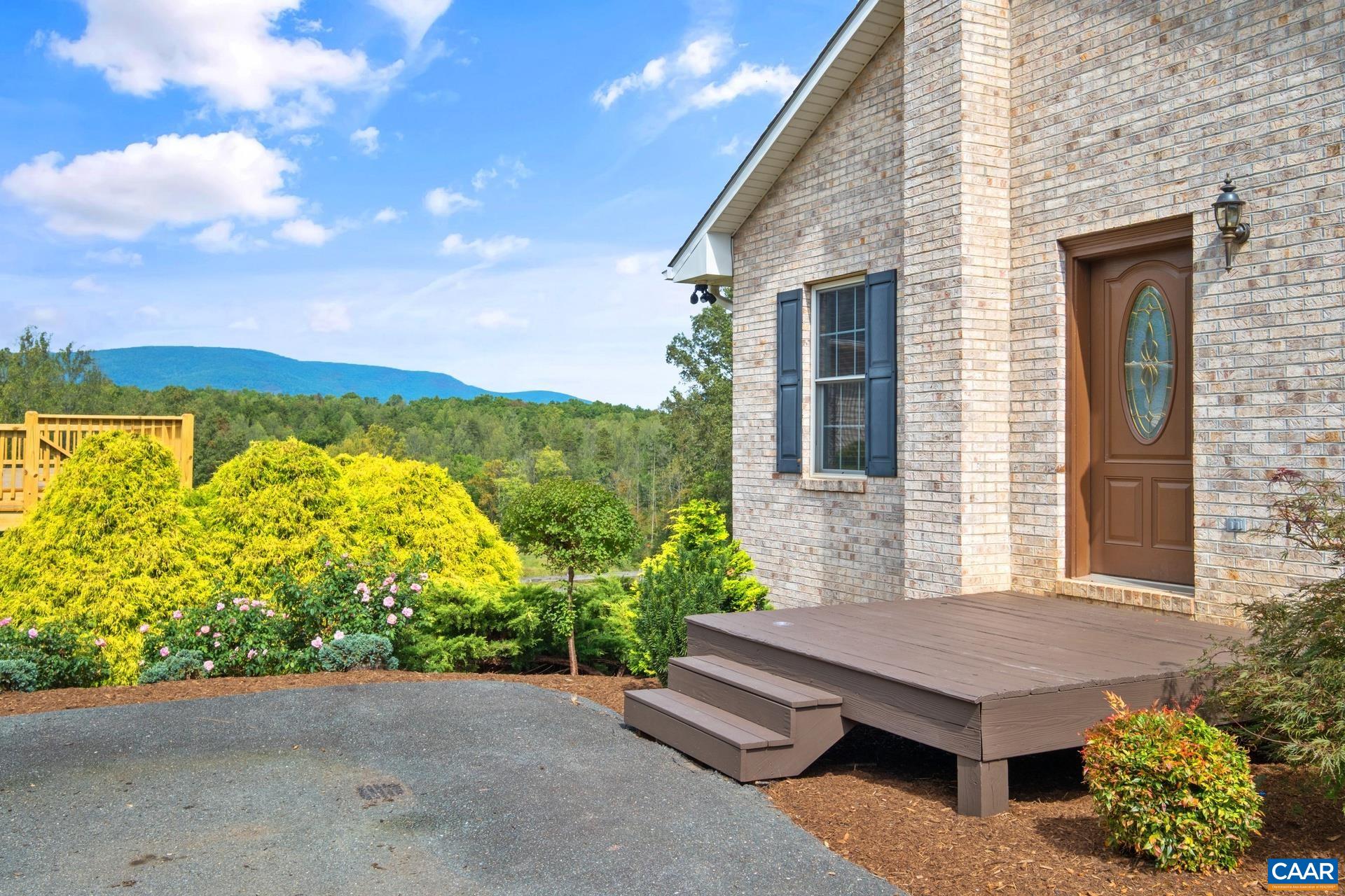 7550 Plank Road Afton, VA 22920 - Photo 11 of 49 a view of a terrace with a garden