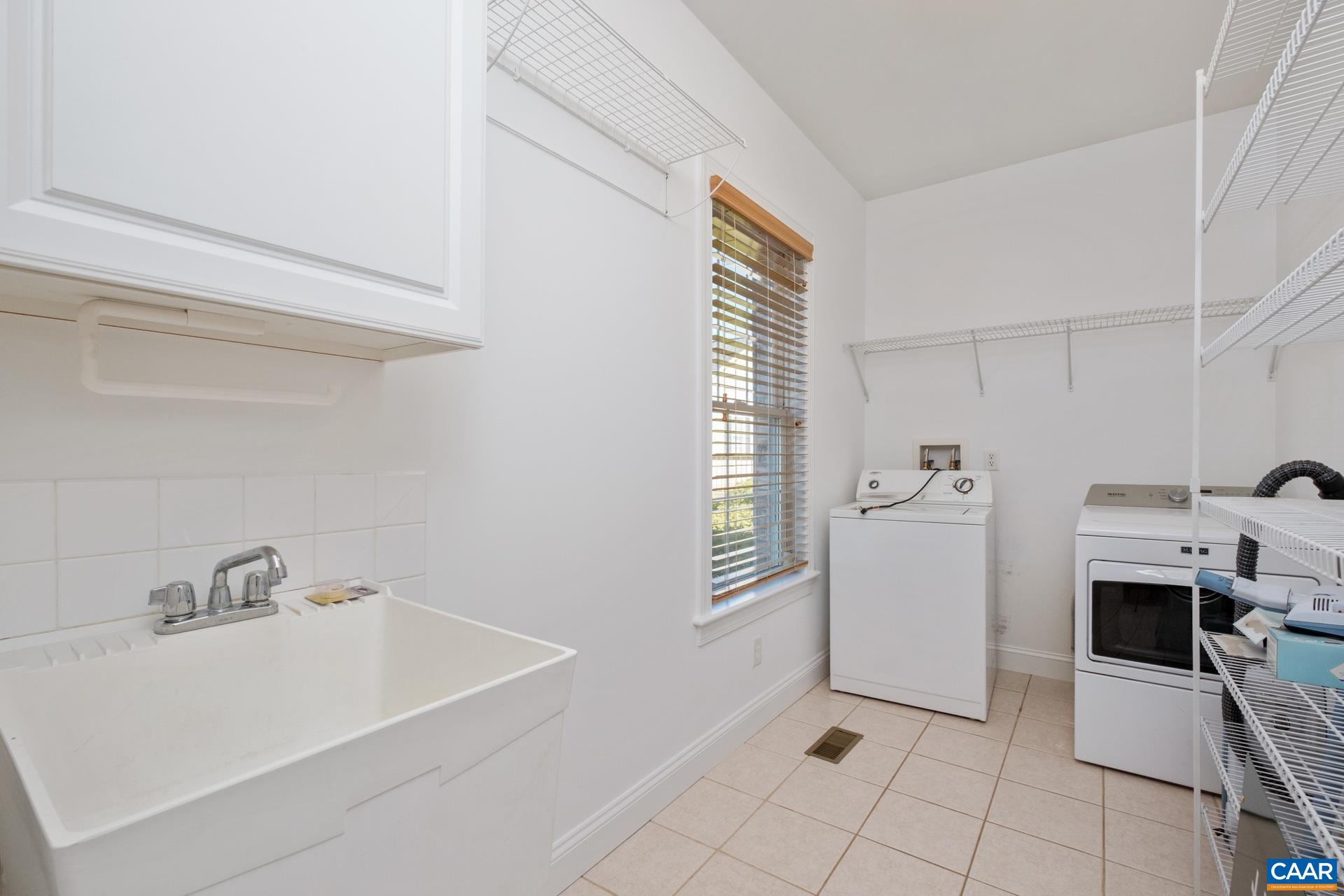 7550 Plank Road Afton, VA 22920 - Photo 19 of 49 a view of a kitchen with furniture and washing machine
