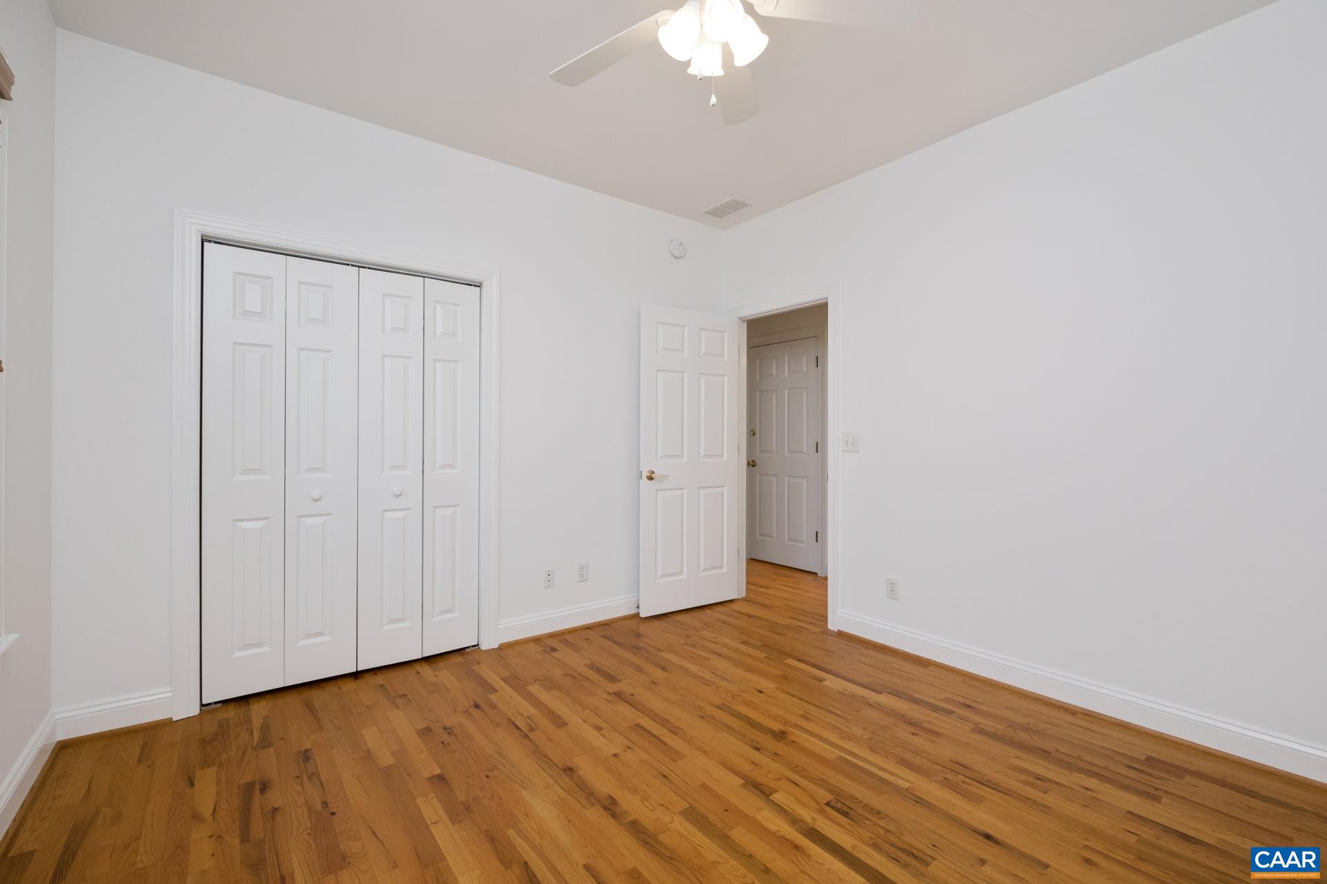 7550 Plank Road Afton, VA 22920 - Photo 25 of 49 a view of a room with wooden floor and white walls