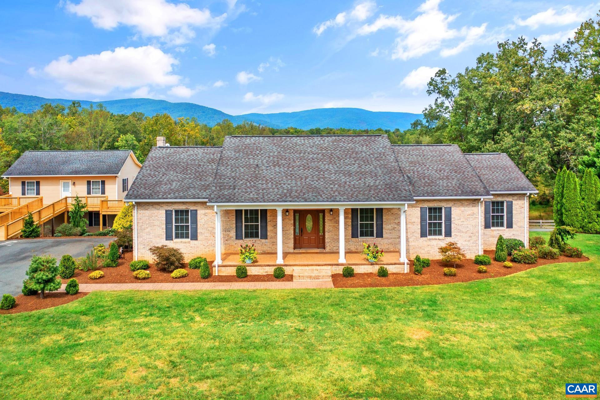 7550 Plank Road Afton, VA 22920 - Photo 3 of 49 a front view of a house with garden