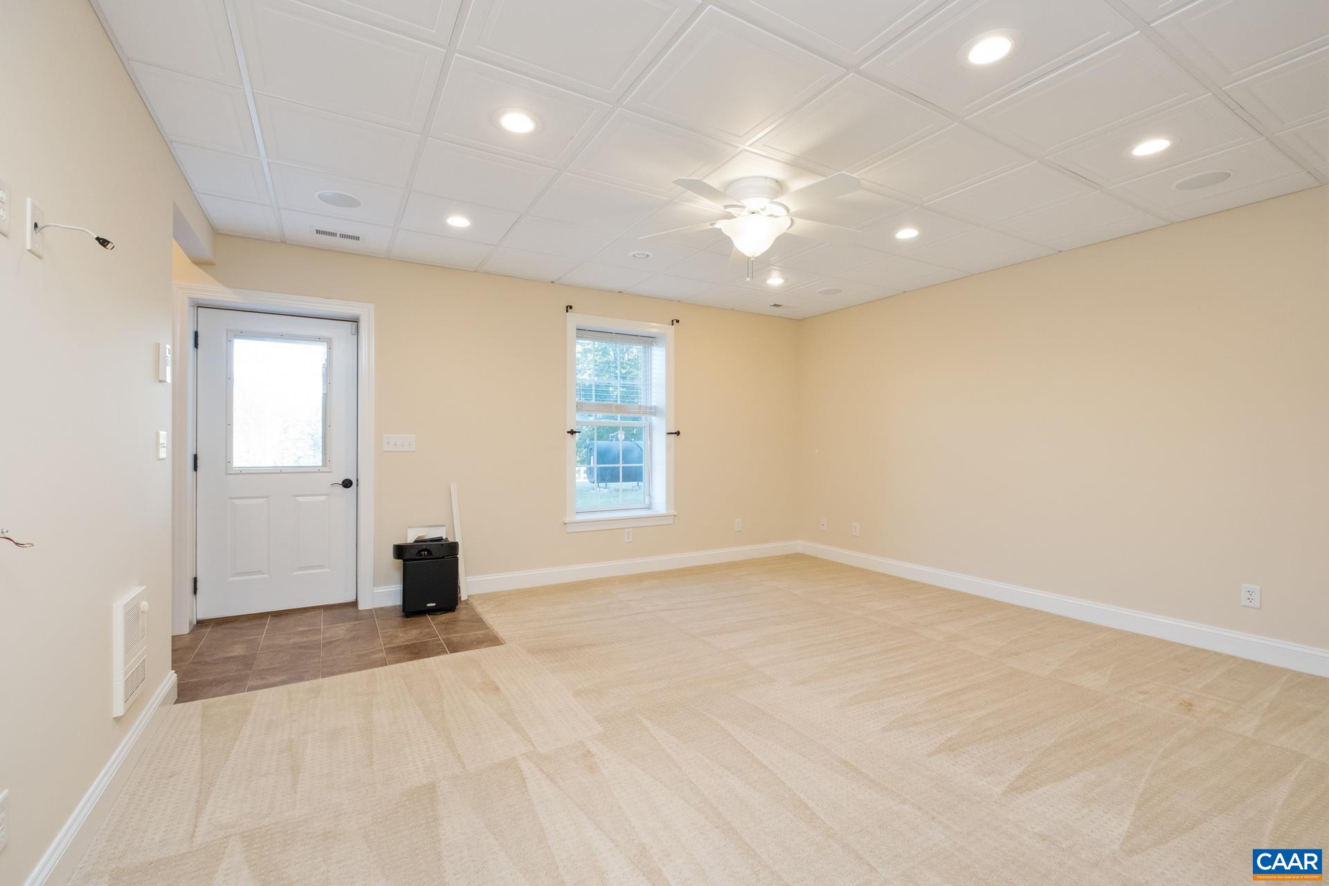 7550 Plank Road Afton, VA 22920 - Photo 31 of 49 an empty room with a empty space and windows