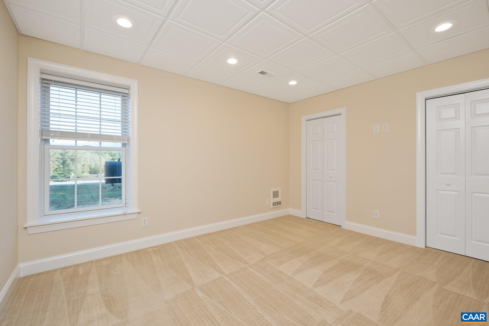 7550 Plank Road Afton, VA 22920 - Photo 34 of 49 an empty room with a window