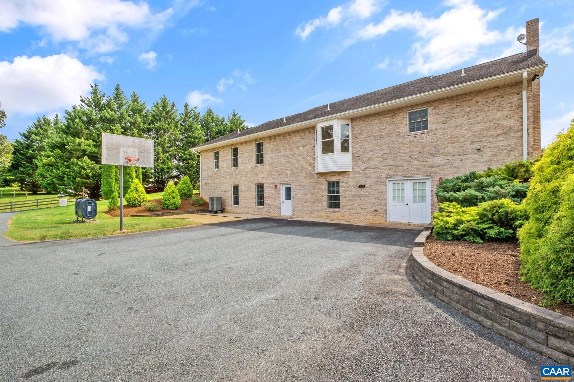 7550 Plank Road Afton, VA 22920 - Photo 37 of 49 a view of a house with backyard and tree