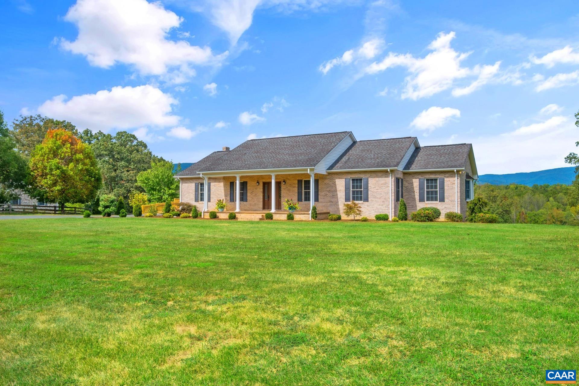 7550 Plank Road Afton, VA 22920 - Photo 4 of 49 a front view of a house with a garden