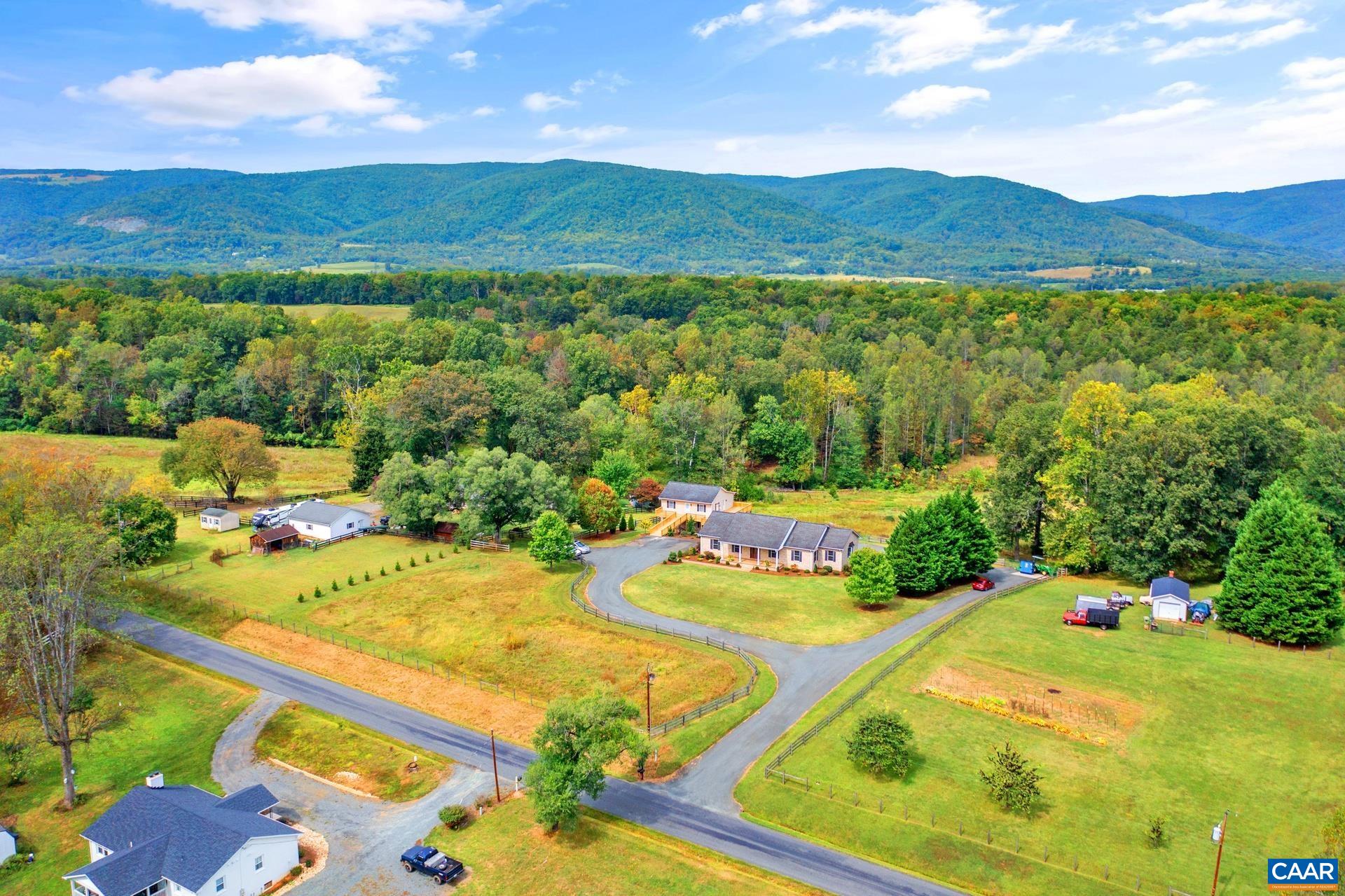 7550 Plank Road Afton, VA 22920 - Photo 41 of 49 a view of a swimming pool with a yard