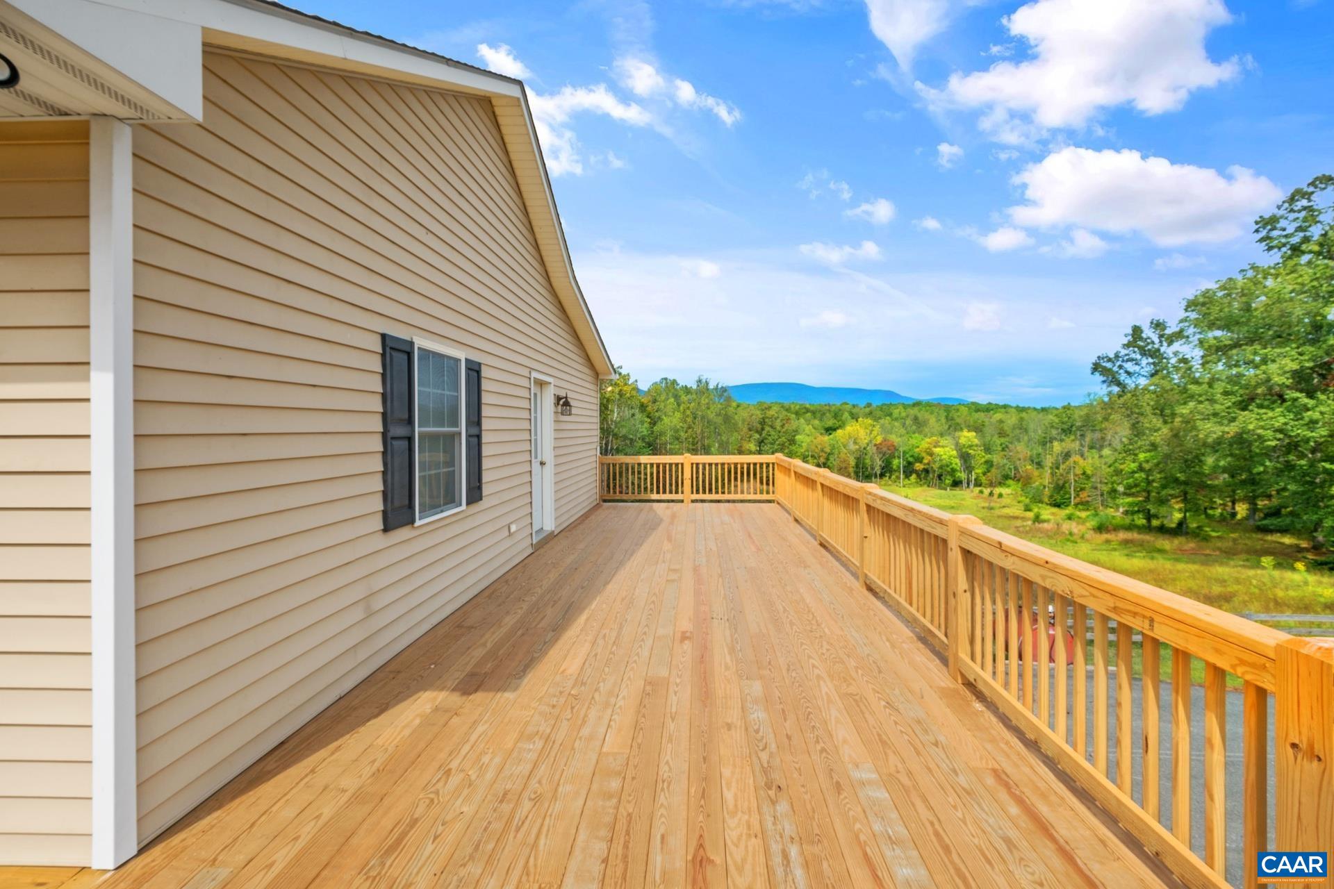 7550 Plank Road Afton, VA 22920 - Photo 46 of 49 a view of balcony with wooden floor and fence