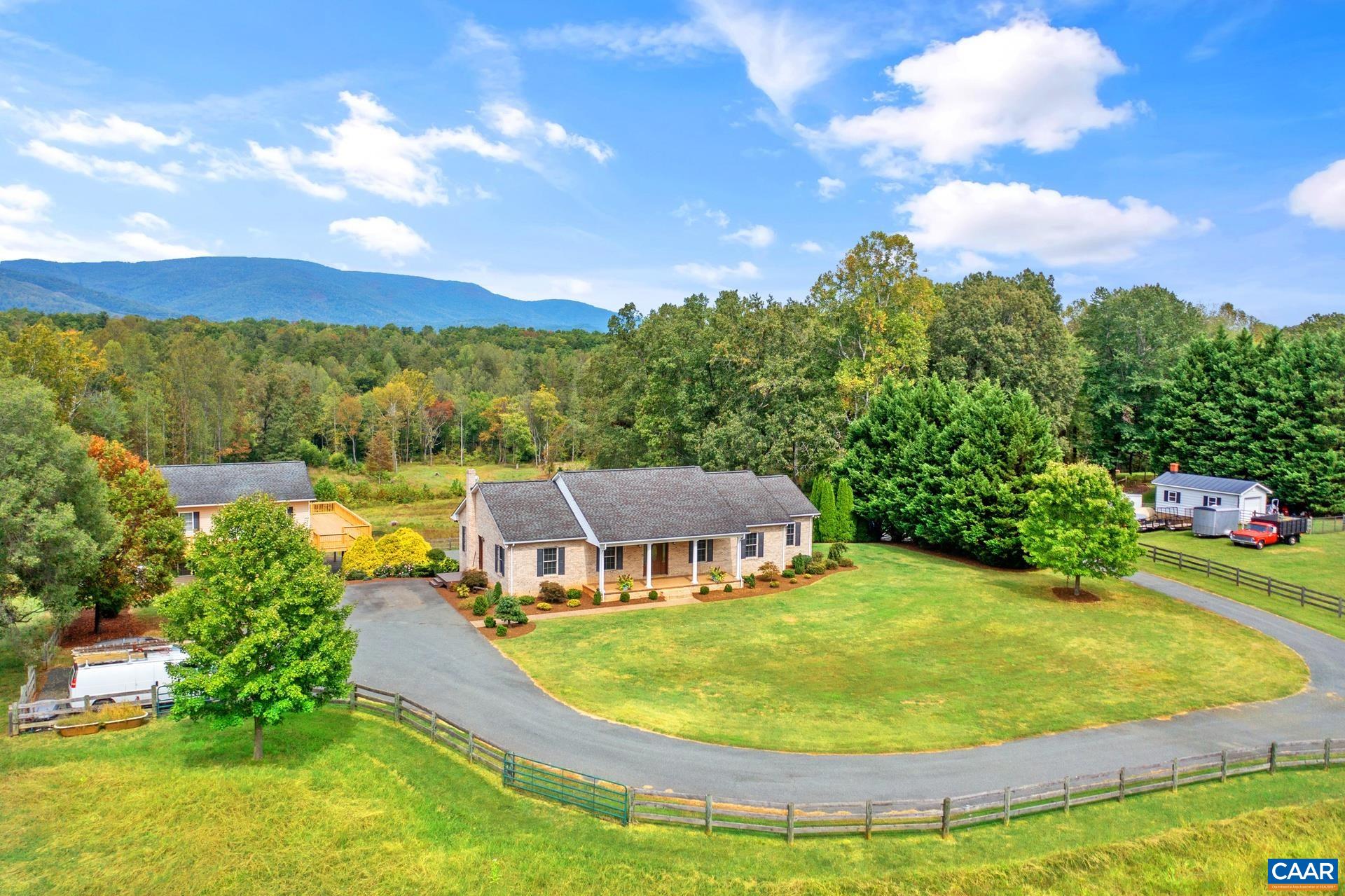 7550 Plank Road Afton, VA 22920 - Photo 6 of 49 a view of a swimming pool with a yard