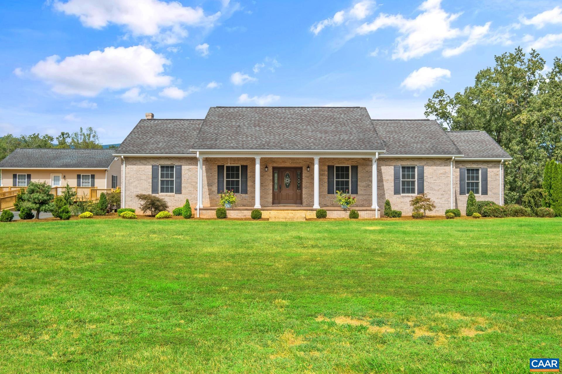 7550 Plank Road Afton, VA 22920 - Photo 8 of 49 a front view of a house with a yard