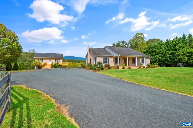 a view of house with outdoor space and street view