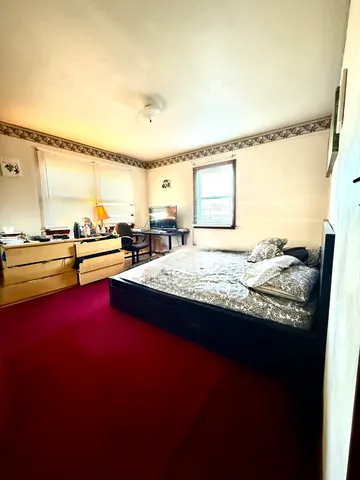 a living room with hard wood floor