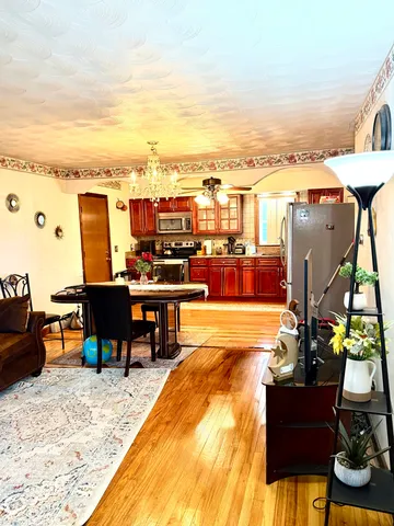 a view of a swimming pool with furniture