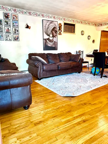a living room with couch and a table
