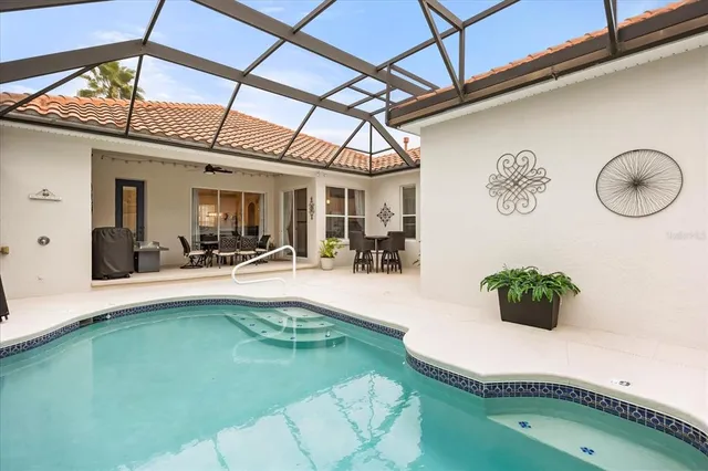 a view of a living room and kitchen